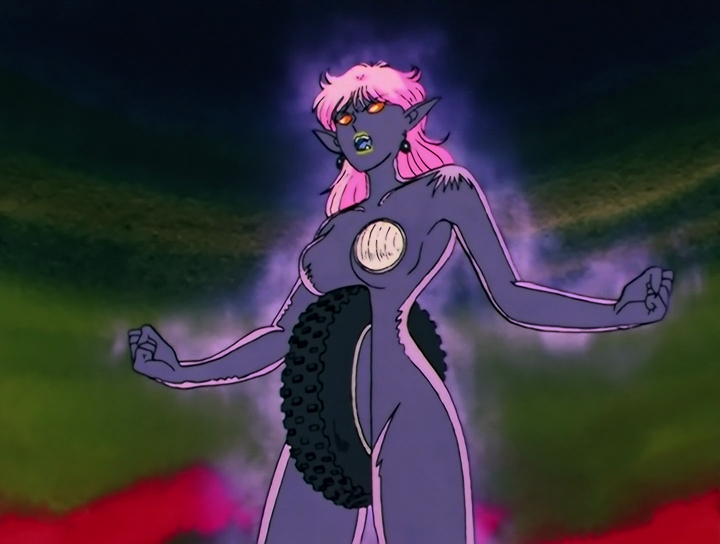Taiyan, a Daimon from Sailor Moon episode 98. Hoo boy. Imagine a woman made entirely out of gray rubber, with long pink hair and solid orange eyes. Now imagine she has a large tire wedged way up where her crotch should be, and also one of her boobs is a headlight.